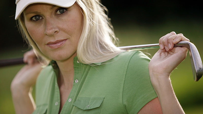 Woman-with-golf-club.jpg
